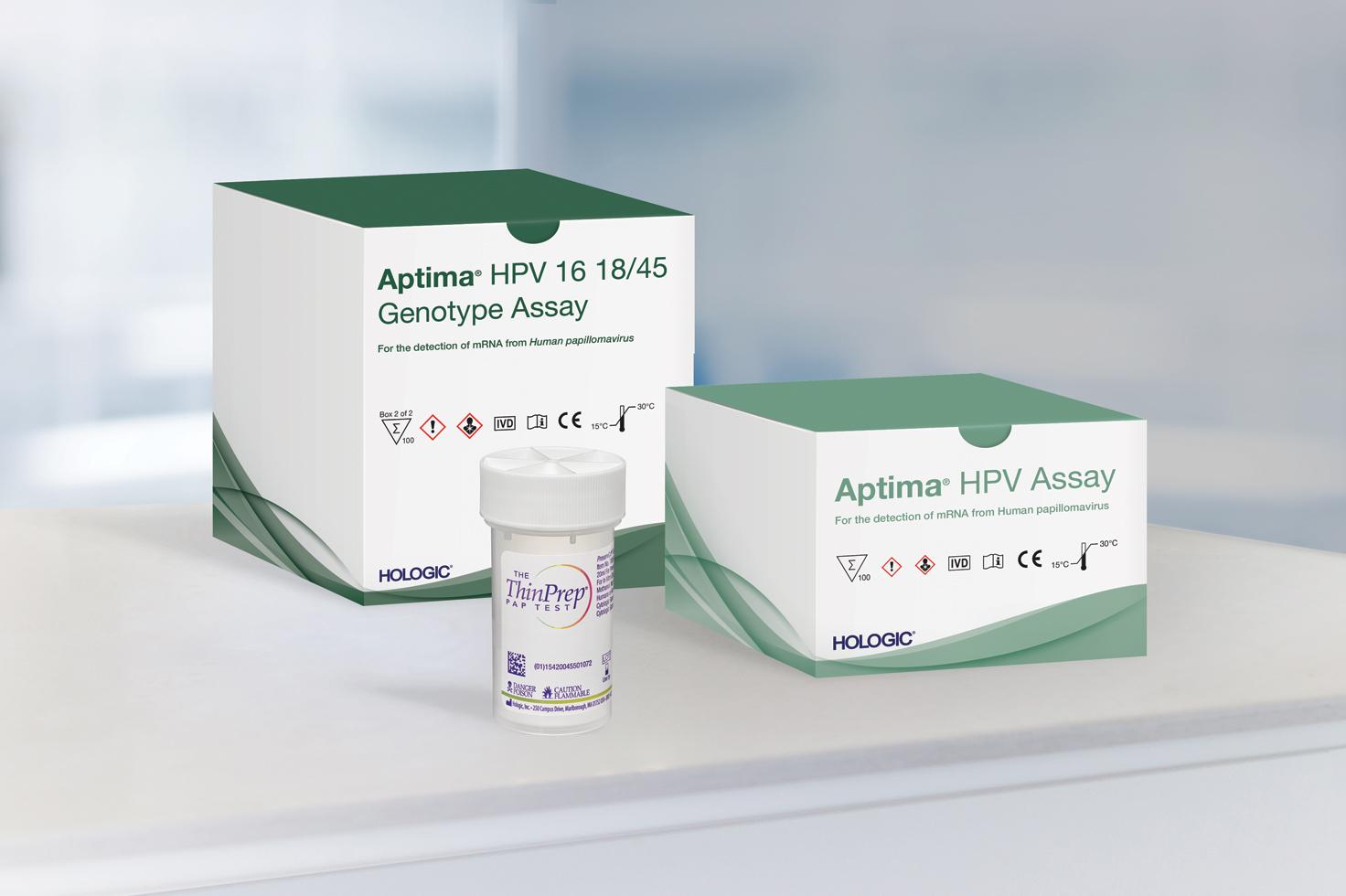 Photo of Aptima Assay products sitting on white table in a lab setting.