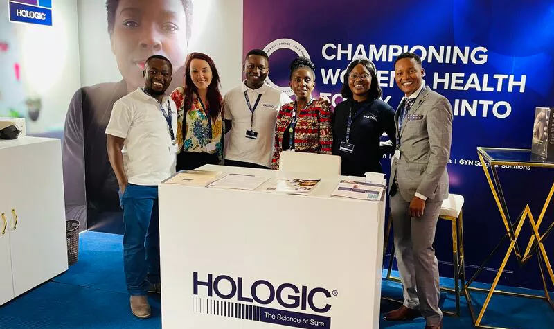 Group photo at Hologic exhibit at the international AIDS conference.