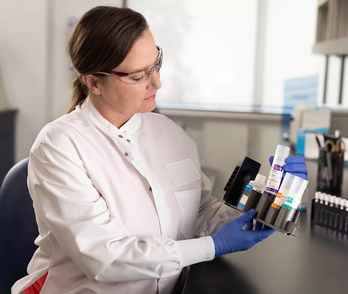Lab technician viewing test results