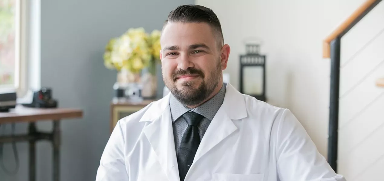 Smiling healthcare provider in office setting