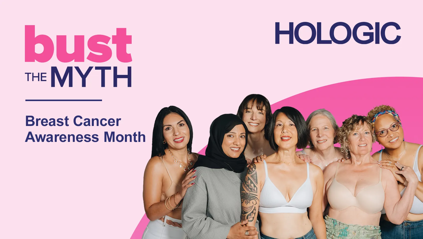 Group photo of smiling women on pink background