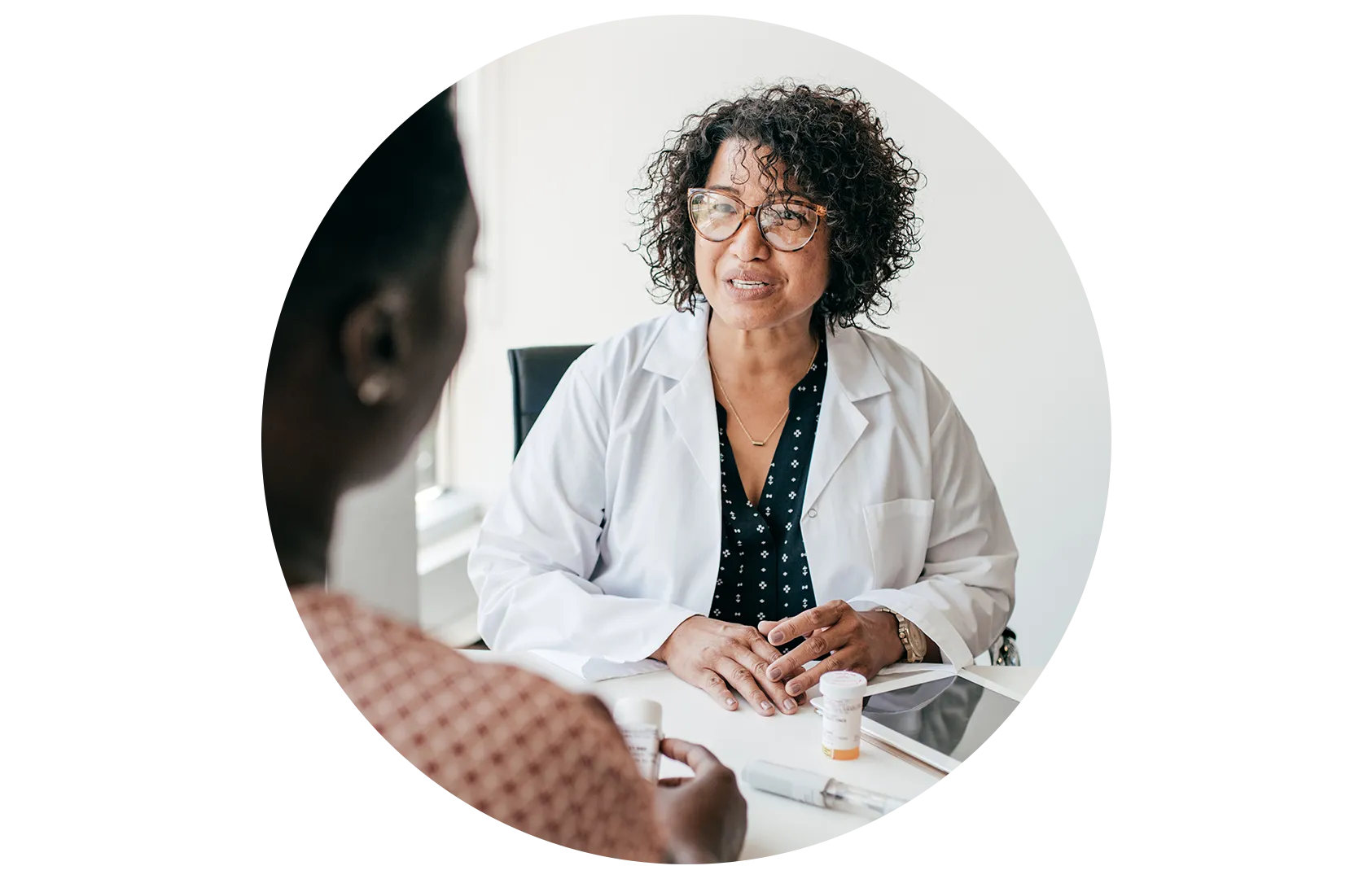 Doctor and Patient discussing Well Woman exam