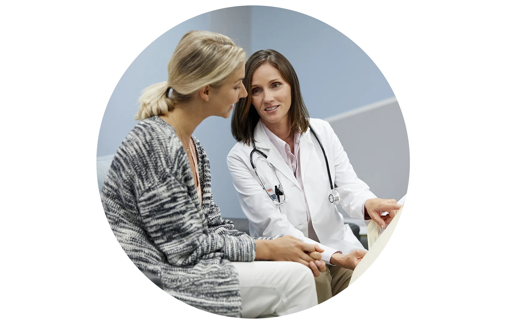 Doctor and patient discussing breast cancer testing