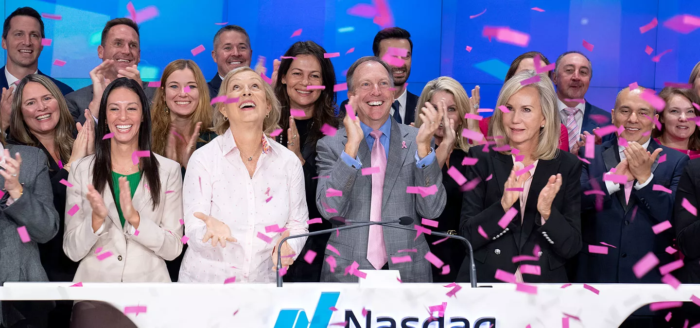 Hologic leadership celebrating among confetti.