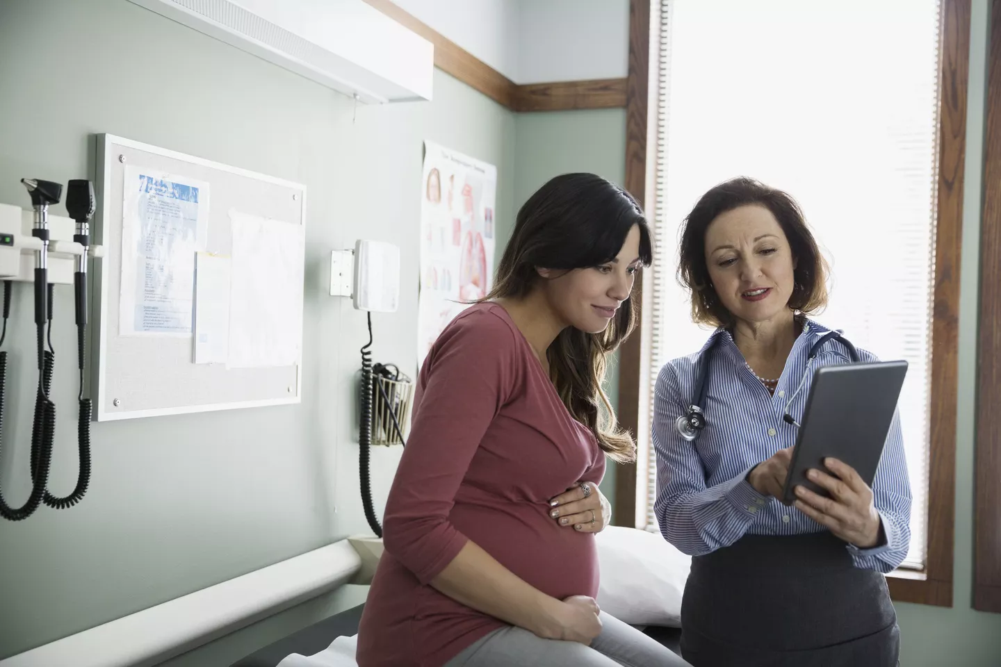 provider talking to patient in lab setting